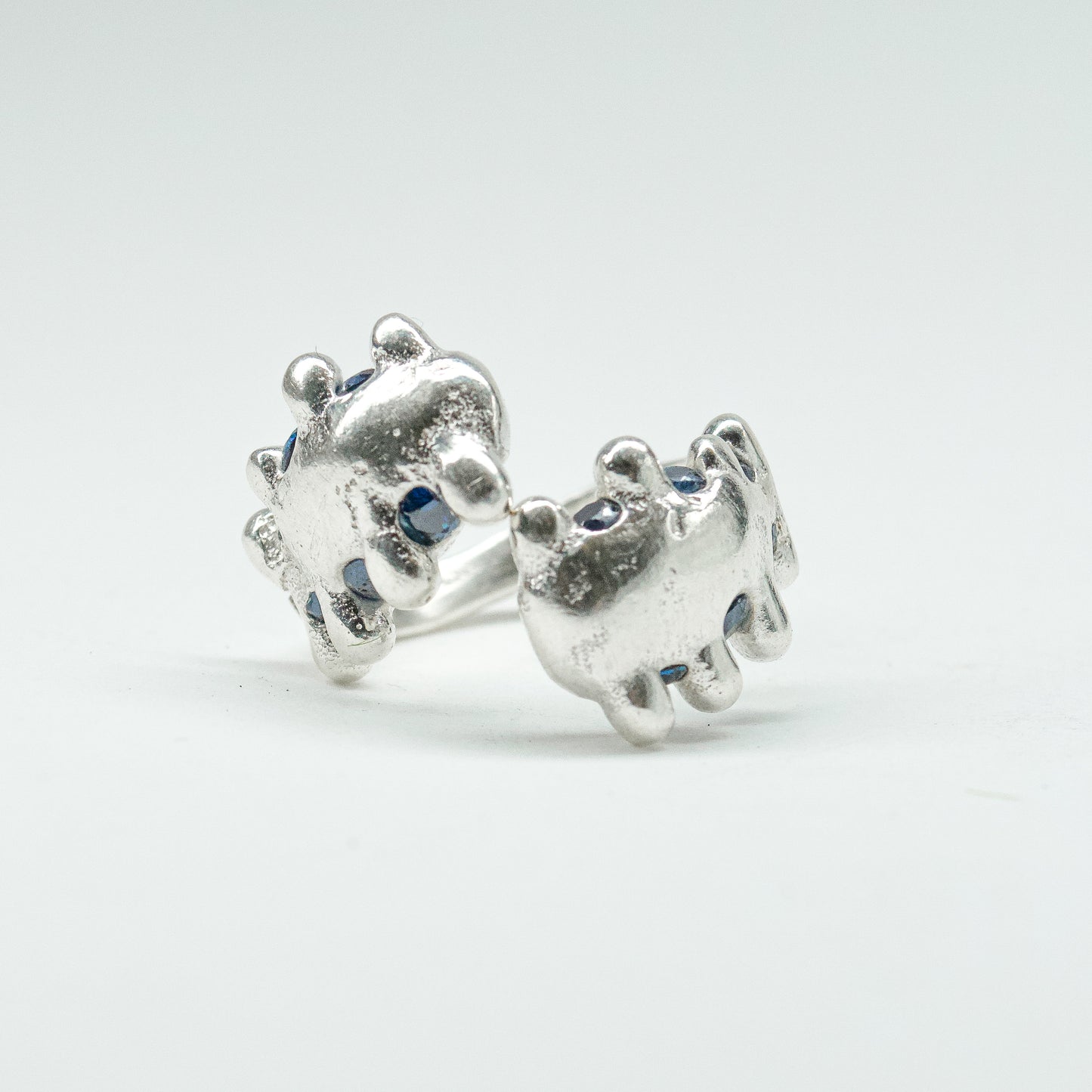 CATERPILLAR OPEN RING - BLUE GEMS