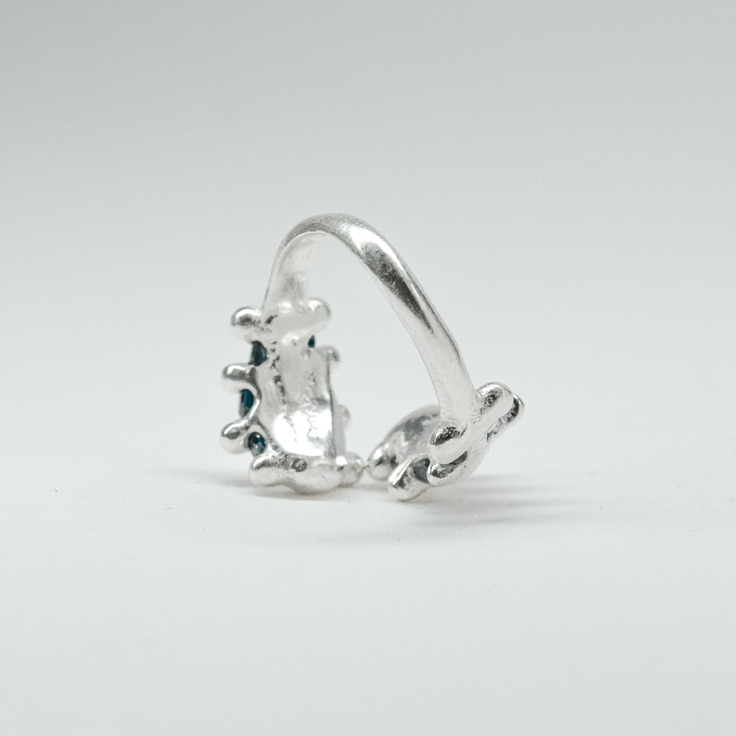 CATERPILLAR OPEN RING - BLUE GEMS