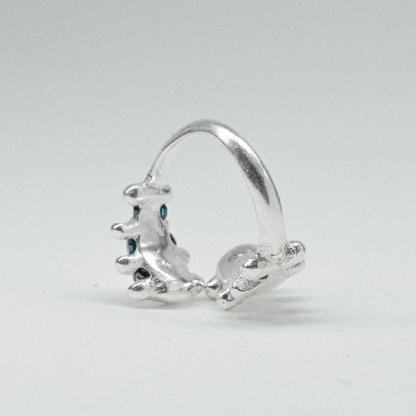 CATERPILLAR OPEN RING - BLUE GEMS
