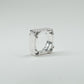 Hand-sculpted sterling silver ring with a bold, square silhouette and deep textured finish, featuring small round gemstones set into each corner.