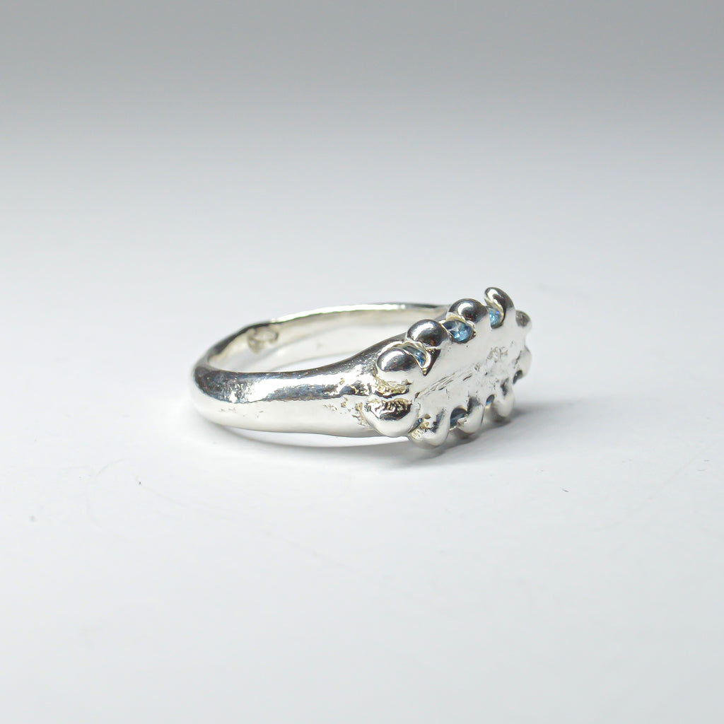 CATERPILLAR CROWN RING - BLUE GEMS