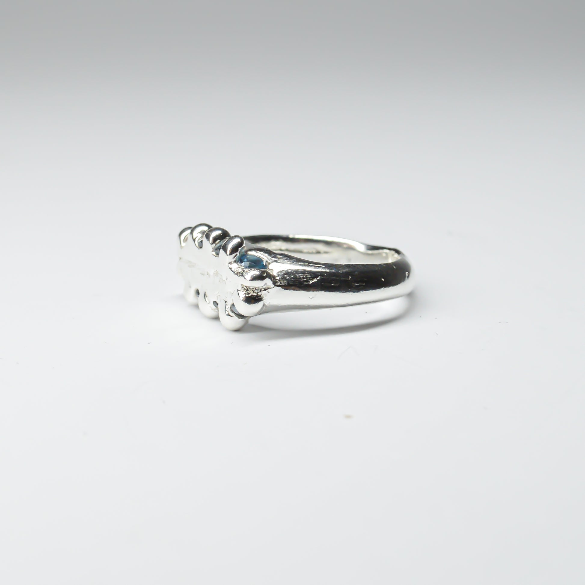 CATERPILLAR CROWN RING - BLUE GEMS