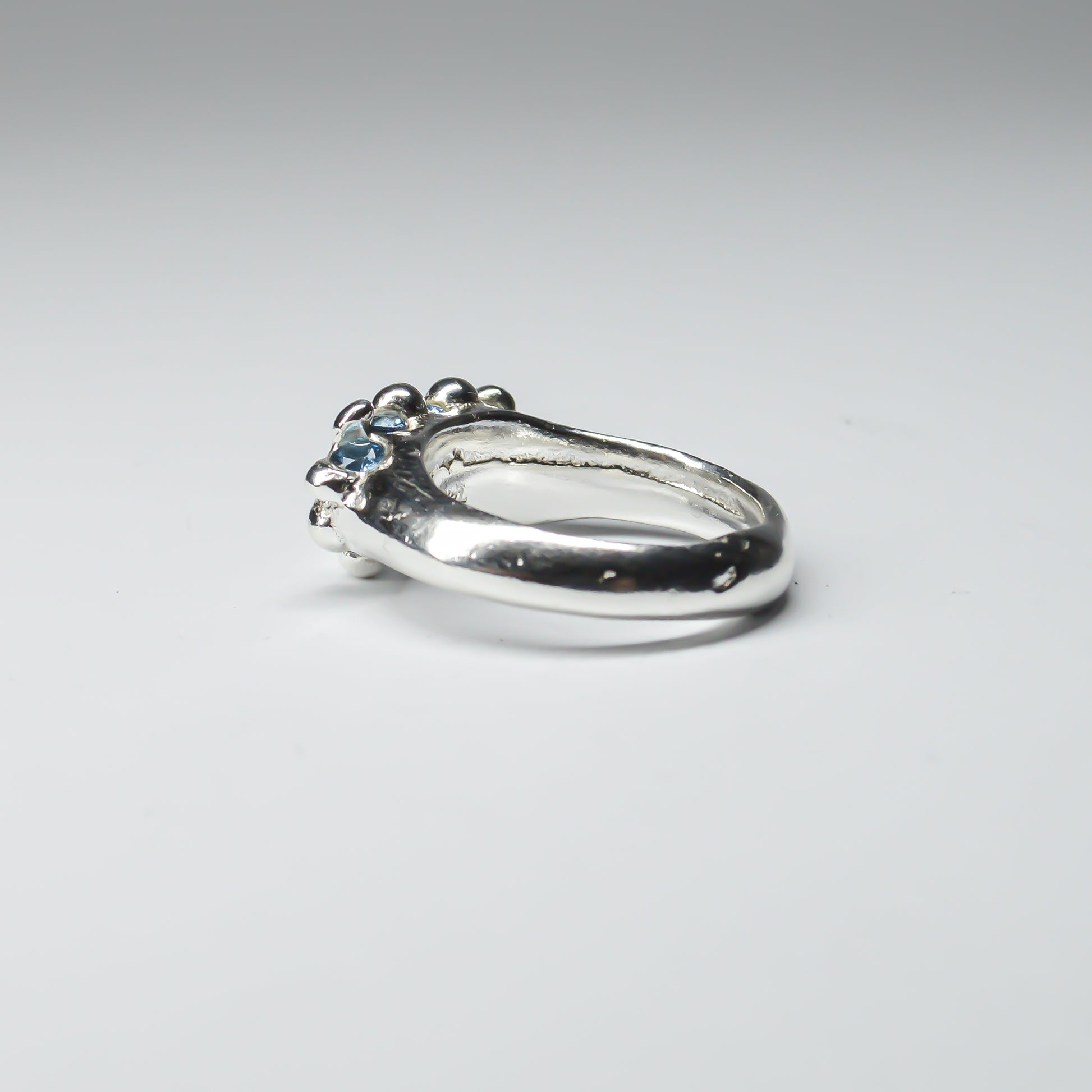 CATERPILLAR CROWN RING - BLUE GEMS